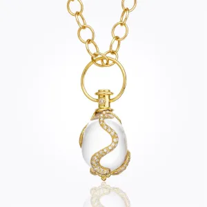 18K Serpent Amulet with oval rock crystal, blue sapphire and diamond pavé