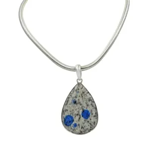 A graceful large teardrop shaped K2 Jasper statement Pendant in open back bazel setting