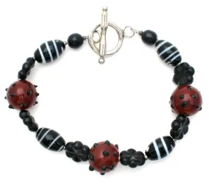 Brown and Black Lampwork Art Glass Bead Bracelet 8.75"