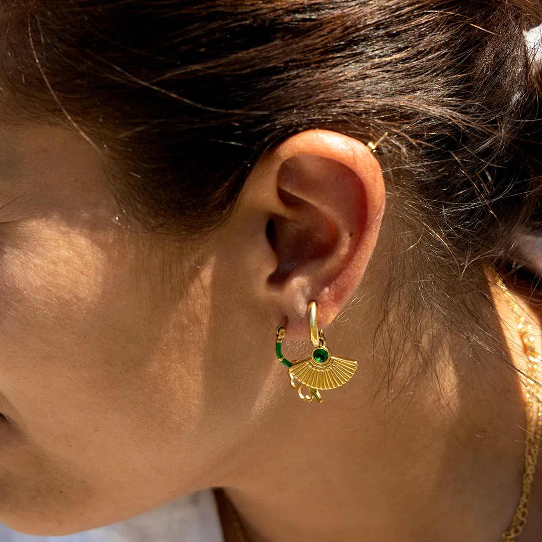 Gold coloured hoop earrings with a peacock tail